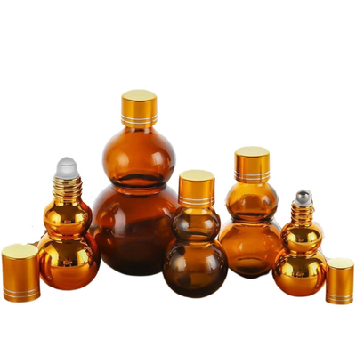 رولی روغن عطر گلس امبر 100 میلی لیتر با دو سرپوش طلایی و پایه ضخیم